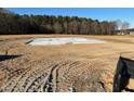 New home construction foundation on a wooded lot at 190 Citizens Ct # 33, Four Oaks, NC 27524