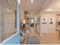 Bright and spacious entryway with light hardwood floors at 271 White Azalea Way, Homesite 30, Benson, NC 27504