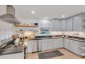 Bright kitchen with modern appliances, sleek countertops, and light wood flooring, perfect for cooking at 710 Spring Ln, Sanford, NC 27330