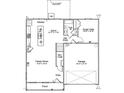 First floor plan showcasing a kitchen, Gathering room, guest suite and garage at 65 Calabria Ct, Franklinton, NC 27525