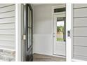 Modern front entrance with black and white door at 8816 Melvin St # 15, Willow Springs, NC 27592