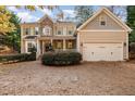 Two-story house with stone accents and driveway at 1620 Dunn Rd, Raleigh, NC 27614
