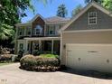 Two-story house with stone accents and attached garage at 1620 Dunn Rd, Raleigh, NC 27614