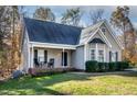 Charming one story home with a cozy front porch and well-maintained lawn at 170 Carrington Ave, Franklinton, NC 27525