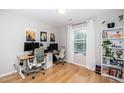 Bright home office with two desks, modern chairs, and hardwood floors at 1320 S State Street # D, Raleigh, NC 27610