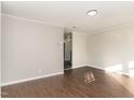 Bright living room with modern flooring, neutral paint, and simple trim at 3015 E Brinkley Dr, Spring Lake, NC 28390