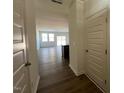Inviting entryway with sleek flooring and view of the open floor plan at 126 Parker Ln, Mebane, NC 27302
