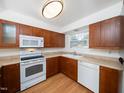 Well-equipped kitchen featuring ample cabinetry and modern appliances at 7124 Longstreet Dr # B, Raleigh, NC 27615