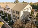 Aerial view of townhomes showcasing classic architecture, landscaping, and convenient parking at 1120 Renewal Place # 108, Raleigh, NC 27603