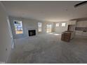 Spacious living room with fireplace and access to back deck at 150 Steppe Way, Garner, NC 27529