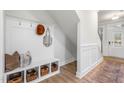 Cozy mudroom with bench, coat hooks, storage cubbies, and an inviting entrance for a practical space at 211 Pond View Ct # 5, Fuquay Varina, NC 27526