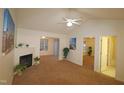 Spacious living room featuring a fireplace, high ceilings and multiple room access at 11321 Involute Pl # 102, Raleigh, NC 27617