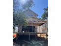 New construction home featuring a back porch and deck at 3302 Hall Pl, Raleigh, NC 27607