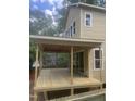 A new wooden deck under construction featuring an open-air design and sliding glass door access at 3302 Hall Pl, Raleigh, NC 27607