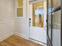 Interior front door detail with view of the stairs and wood flooring at 203 Pond Vw Ct # 1, Fuquay Varina, NC 27526