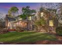 Brick house with a screened porch and deck at 106 Alder Pl, Chapel Hill, NC 27517