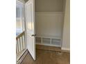 Built-in bench with cubbies in an entryway at 2476 Field Poppy Dr # 171, Apex, NC 27502