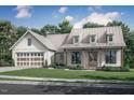 Finished exterior of a house with a two-car garage, dormer windows, a sidewalk and a landscaped yard at 2850 Sheep Pasture Rd, Spring Hope, NC 27882