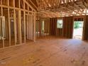 Framed interior view showcasing the layout and structure of a home under construction at 2850 Sheep Pasture Rd, Spring Hope, NC 27882