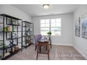 Versatile office space with natural light, built-in shelving, and ample room for productivity at 3930 Well Fleet Drive, Fuquay Varina, NC 27526