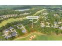Buildable lot in golf course community with wooded area and views of homes at 1245 Golfers Vw, Pittsboro, NC 27312