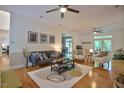 Bright living room featuring hardwood floors and comfy seating at 340 Andrews Store Rd, Pittsboro, NC 27312