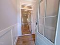 Inviting foyer with wood-look floors and detailed trim, showcasing the home's bright and open floor plan at 403 Duncan Creek Rd # 131, Lillington, NC 27546