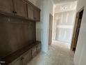Mudroom featuring a bench with storage and coat hooks at 303 Chesapeake Cmns St # 99, Garner, NC 27529