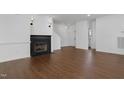 Bright living room with hardwood floors and fireplace at 1004 Gold Rock Ln, Morrisville, NC 27560