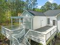 An expansive deck offers great space for outdoor entertaining at 1408 Ferrell Ct, Creedmoor, NC 27522