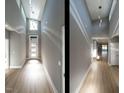 Bright foyer with hardwood flooring, high ceilings, modern lighting, and a view of the front door at 145 Ottawa Dr, Louisburg, NC 27549