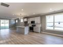 Bright, open kitchen boasts an island, stainless steel appliances, and ample cabinet space at 145 Ottawa Dr, Louisburg, NC 27549
