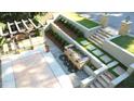 Beautifully landscaped backyard with stone pathways, a pergola, and a tiered water fountain at 2213 Weybridge Dr, Raleigh, NC 27615