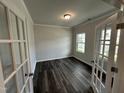 Home office with wood-look floors and french doors at 3701 Watson Ridge Ln # Tessa, Raleigh, NC 27616