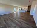 Spacious living room showcases hardwood floors and natural light from multiple windows at 17 E Victory View Ter, Smithfield, NC 27577