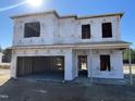 New two-story home exterior with attached garage, under construction at 179 Deodora Ln, Cameron, NC 28326