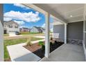 View from the covered porch showing the neighborhood and street at 467 Ravensworth Dr, Garner, NC 27529