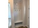 Mud room features coat hooks, seating, and convenient storage at 145 Surles Landing Way, Benson, NC 27504