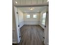 Bright office with wood-look flooring and windows that offer a scenic view at 427 Rising Star Dr, Clayton, NC 27520