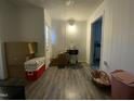 A hallway with boxes and a baby bassinet at 1124 S Church St, Rocky Mount, NC 27803