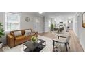 Bright living room showcasing modern furniture, decor, and an open floor plan at 103 Park Dr, Oxford, NC 27565