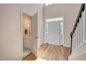 Small half bathroom with white vanity and black and white floor at 106 Dairy Ct, Chapel Hill, NC 27516
