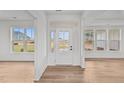 Bright and airy entryway with hardwood floors and a view to the backyard at 132 Tennyson Dr, Garner, NC 27529