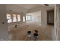 Bright, open living area featuring several windows and a high, vaulted ceiling at 132 Tennyson Dr, Garner, NC 27529