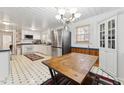 Eat-in kitchen with stainless steel appliances and ample cabinet space at 253 Ronald Tharrington Rd, Louisburg, NC 27549