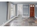 Entryway with slate tile flooring and built-in shelving at 318 Asbury Church Rd, Sanford, NC 27330