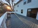 Back deck with a grill and sliding glass door access at 4300 Hickory Ridge Dr, Raleigh, NC 27609