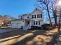 Well-maintained two-story home with a two-car garage, front yard, and sunlight at 4300 Hickory Ridge Dr, Raleigh, NC 27609