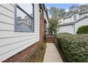 Brick and siding exterior with walkway and landscaping at 118 Talon Dr, Cary, NC 27518