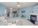 Open concept living area with kitchen and breakfast bar visible at 1316 Holly Grove Way, Durham, NC 27713